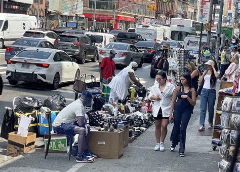 old woman in chinatown selling fake watch|Bag, shoe counterfeiters back in force on NYC's Canal Street.